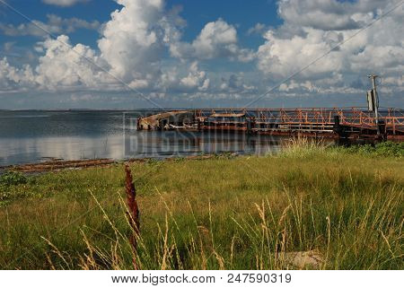Old Pier For Small Boats In The Sea Bay