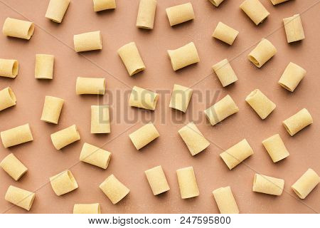 Pattern Made Of Mezzi Pasta On Pink Background, Top View