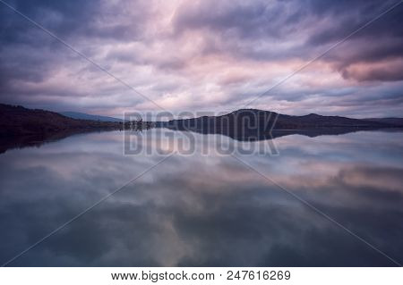 Dramatic Clouds Over Ullibarri Ganboa Town In Alava