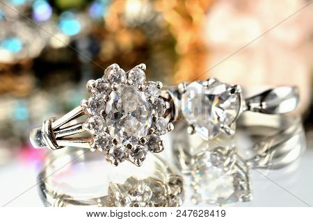 Silver Ring With Artificial Stone And Another Ring In Background - Jewelery, Warm Color Balance