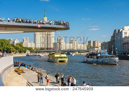 Moscow - June 16, 2018: Tourist Ships Sail On Moskva River Past The Floating Bridge In Zaryadye Park