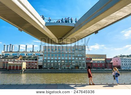Moscow - June 16, 2018: Young Women Take A Picture Under The Floating Bridge In Zaryadye Park During