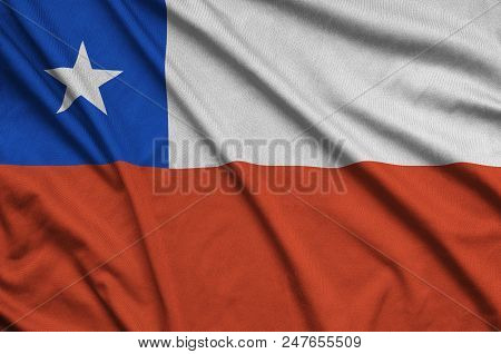 Chile Flag  Is Depicted On A Sports Cloth Fabric With Many Folds. Sport Team Waving Banner