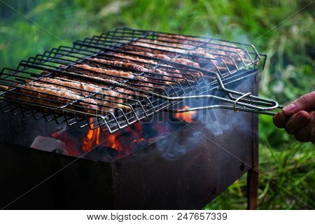 Lulya Kebab From Meat Are Prepared In The Grill. Shish Kebab In The Grill.