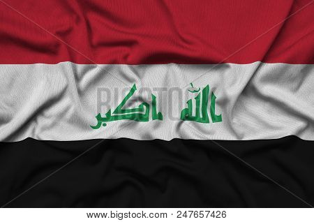 Iraq Flag  Is Depicted On A Sports Cloth Fabric With Many Folds. Sport Team Waving Banner