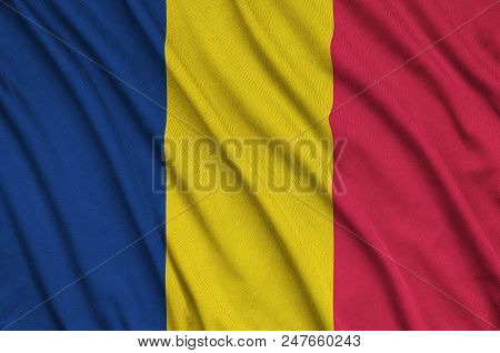 Chad Flag  Is Depicted On A Sports Cloth Fabric With Many Folds. Sport Team Waving Banner
