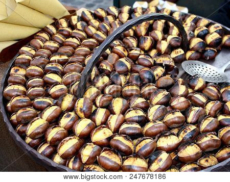 The Most Beautiful And Delicious Chestnuts In A Cast Of Iron  That You Can Eat In Rome In The Square
