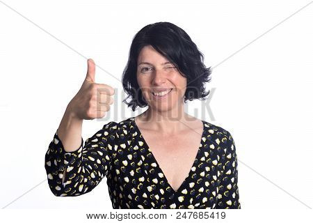 Portrait Of A Woman With Tumbs Up On White