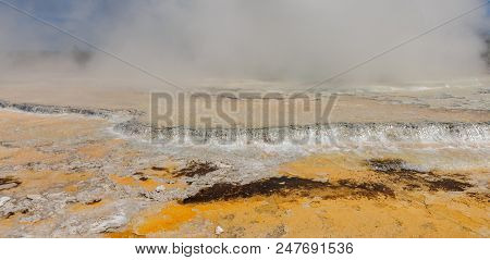 Colorful Bacteria Mats Form Near The Great Fountain Geyser In Yellowstone National Park.