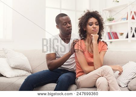Young African-american Couple Quarreling At Home, Woman Offended. Family Relationship Difficulties C