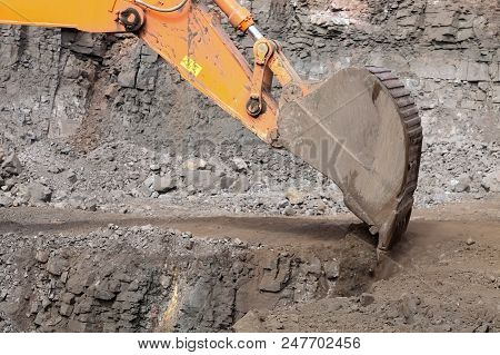 Manganese Mining Sorting And Processing Of Ore Rock With Excavator