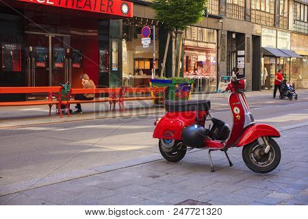 Vienna, Austria - May, 22: Old Red Italian Scooter Called Vespa Manufactured By Piaggio Parked In Th