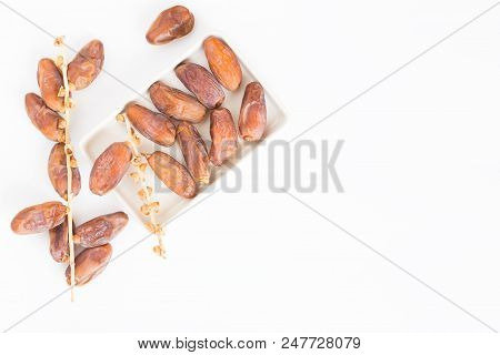 Dates Fruit In Ceramic Bowl White Background,dried Date Palm Fruits Top View