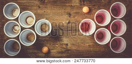College Party Sport - Beer Pong Table Setting With Plastic Cups, Top View