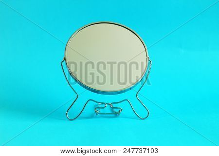 Make Up Mirror, Placed In The Middle, Blue Background, Selective Focus