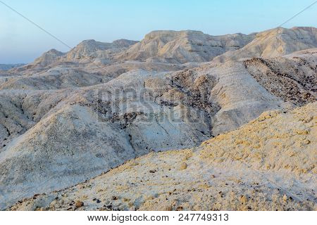 Blue Hour (before Sunrise) View Of Marlstone Rock Formation, In Neot Hakikar, Northern Arava Valley,