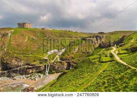 Tintagel, United Kingdom - May 02, 2014: View Of Tintagel Island And Legendary Tintagel Castle Ruins