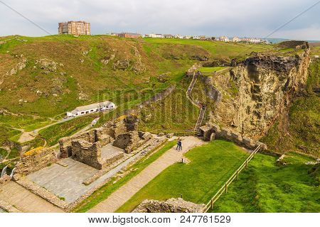 Tintagel, United Kingdom - May 02, 2014: View Of Tintagel Island And Legendary Tintagel Castle Ruins