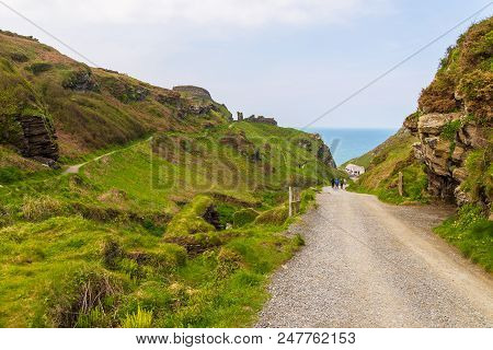 Tintagel, United Kingdom - May 02, 2014: View Of Tintagel Island And Legendary Tintagel Castle Ruins