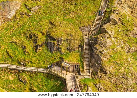 Tintagel, United Kingdom - May 02, 2014: View Of Tintagel Island And Legendary Tintagel Castle Ruins