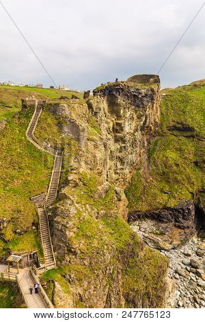 Tintagel, United Kingdom - May 02, 2014: View Of Tintagel Island And Legendary Tintagel Castle Ruins