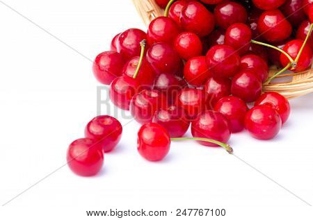 Red Ripe Cherry On A Background