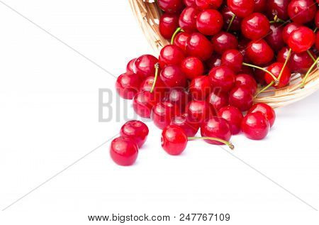 Red Ripe Cherry On A Background