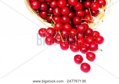 Red Ripe Cherry On A Background