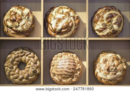 Kalaches. Traditional Ukrainian Several Different Baked Goods On A Wooden Stand, Toned Background Im
