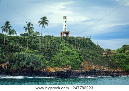 Lighthouse In Mirissa On The Background Of Sunset, Sri Lanka