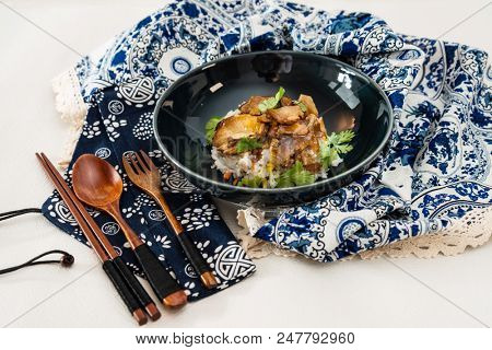 Vietnamese style caramel pork with rice and vegetable