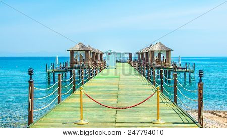 Wooden Beach Pavilions On The Shore Of A Sandy Beach - The Mediterranean Coast, Beldibi, Antalya, Tu