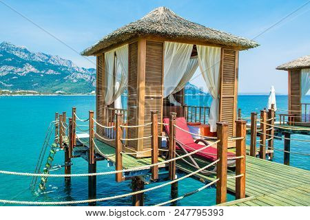Wooden Beach Pavilions On The Shore Of A Sandy Beach - The Mediterranean Coast, Beldibi, Antalya, Tu