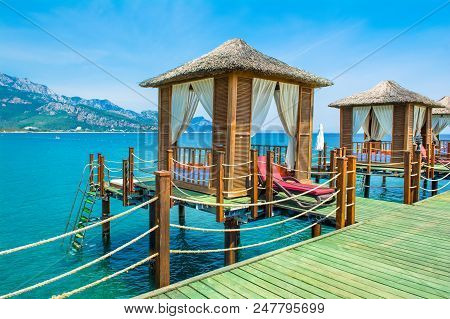 Wooden Beach Pavilions On The Shore Of A Sandy Beach - The Mediterranean Coast, Beldibi, Antalya, Tu