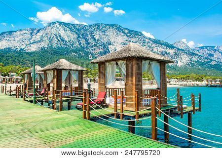 Wooden Beach Pavilions On The Shore Of A Sandy Beach - The Mediterranean Coast, Beldibi, Antalya, Tu