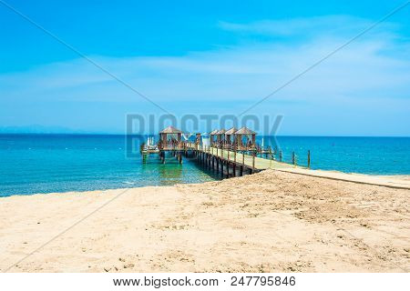 Wooden Beach Pavilions On The Shore Of A Sandy Beach - The Mediterranean Coast, Beldibi, Antalya, Tu