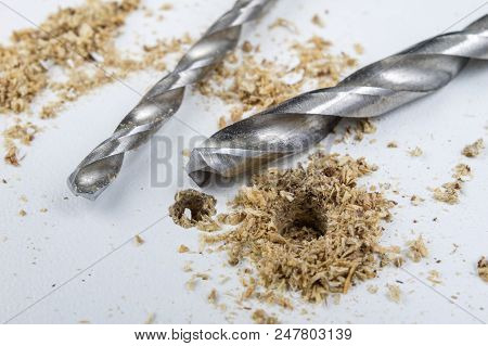 Drilling Holes In Chipboard. Joinery Accessories Used In The Construction Of Furniture.