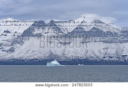 Dramatic Ridge On An Ocean Inlet, Along A Remote Coast Of Greenland Along The Nugssuaq Peninsula