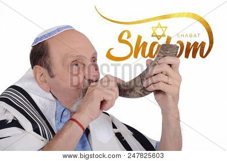Eldery Jewish Man Blowing The Shofar Horn For The Jewish New Year Holiday (rosh Hashanah). Religion 