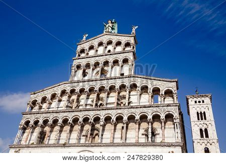 Romanesque facade of Roman Catholic basilica San Michele in Foro in Lucca, Tuscany, Italy