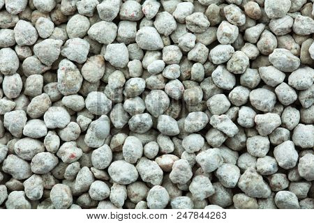 Typical Synthetic or inoraganic chemical fertilizer (or also called plant food) shot from above, High magnification.