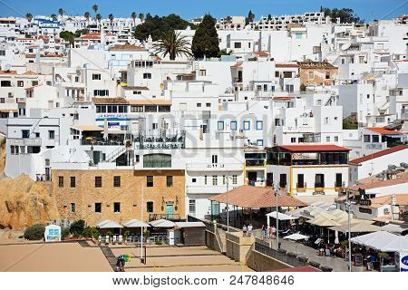 Albufeira, Portugal - June 10, 2017 - Elevated View Of The Town With People Enjoying The Setting, Al