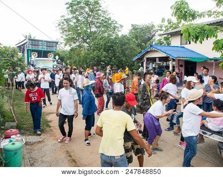 Group Dancing. Local People Participate On The Way To The Temple. Thai Buddhist Culture. Annual Dona