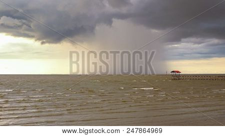 Amazing Seascape With Dramatic Stormy Weather And The Rain At Sipitang Beach,sabah Borneo,malaysia.