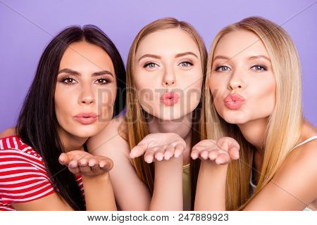 Head Shot Portrait Of Lovely Sweet Girls Blowing Kisses With Pout Lips Palm At Camera Isolated On Vi