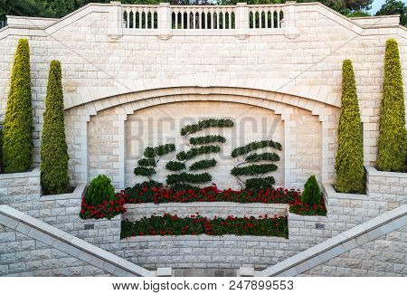 Haifa, Israel, June 30, 2018 : Decoratively Decorated Wall Near The Gate Of The Upper Entrance To Th