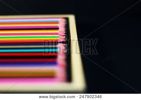 Colored Pencils In The Wooden Box, Selective Focus, Free Copy Space
