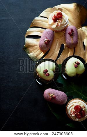 Moscovie Cakes Purple And Lemon Yellow. Pistachio And Fruit. Meringue Anna Pavlova . Culinary Art. G