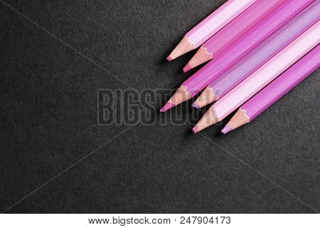 Pink Colored Pencils, Selective Focus, Black Background
