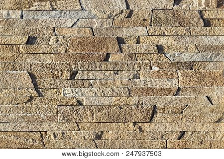 Fragment Of A Wall Made Of Stone. Stone Wall.
